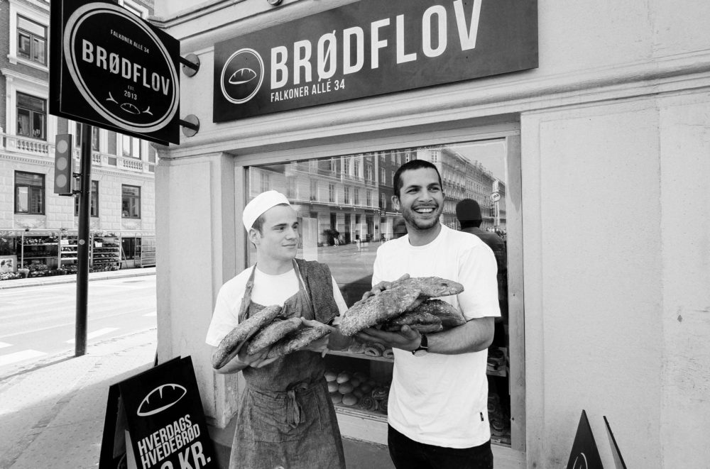 Martin Daniali (right) and a baker outside of Brødflov's store on Frederiksberg, Copenhagen.